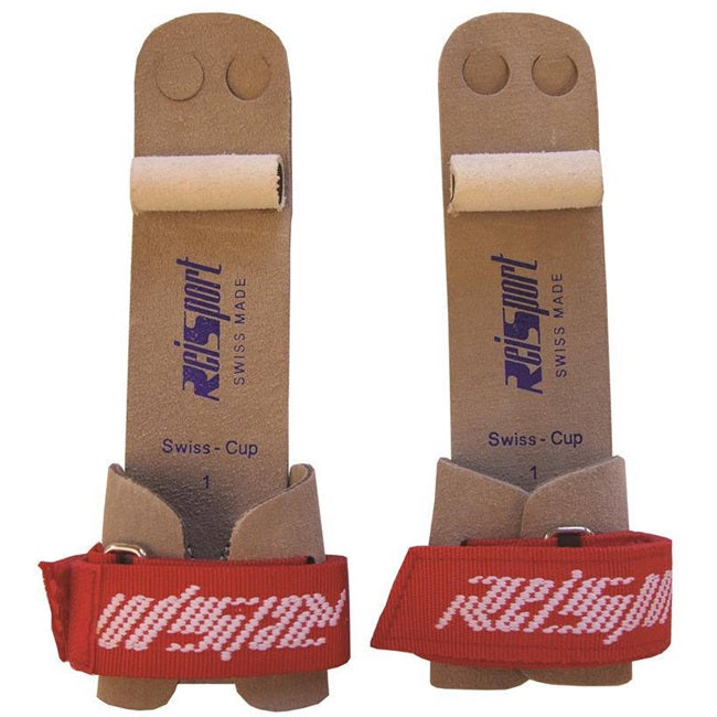 A pair of Reisport men's gymnastics rings with Velcro straps and leather grips, predominantly brown and white with red accents.