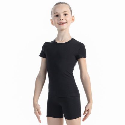 Young girl wearing a black leotard on a white background