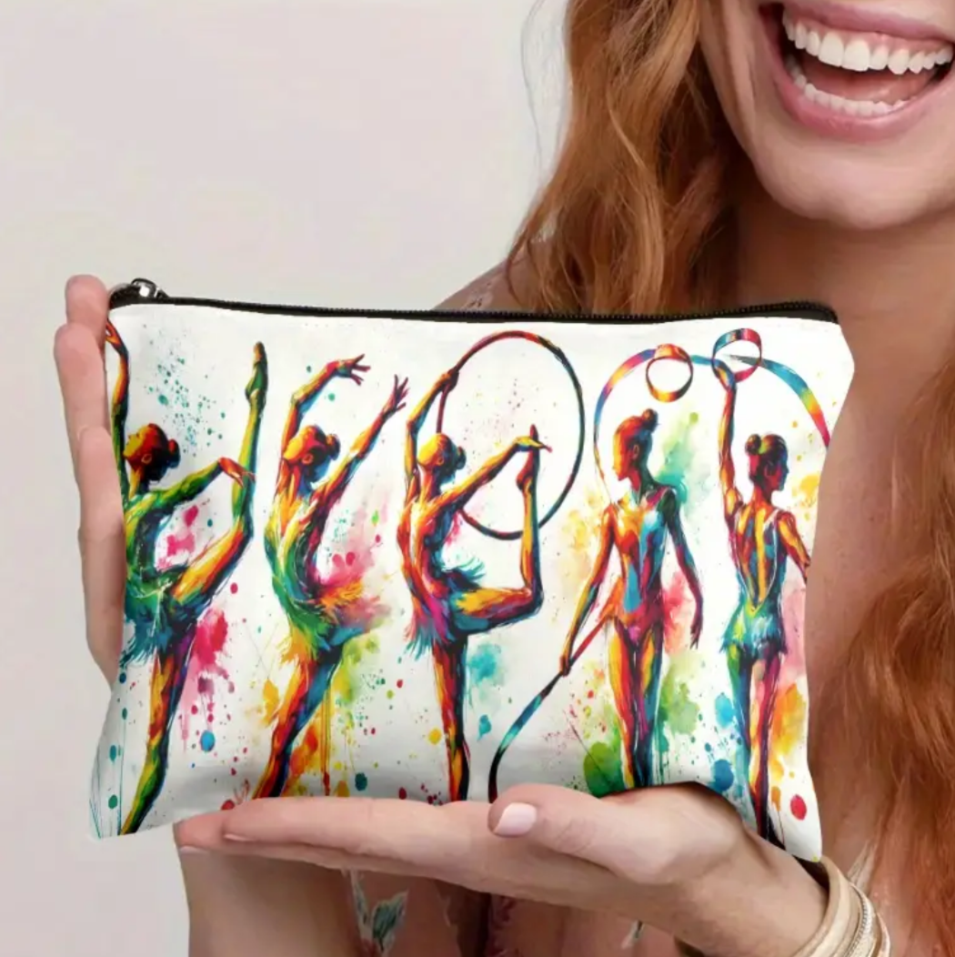 Person holding a colorful pouch with artistic design of people, on a plain background.