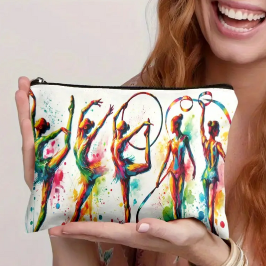 Person holding a colorful pouch with artistic design of people, on a plain background.