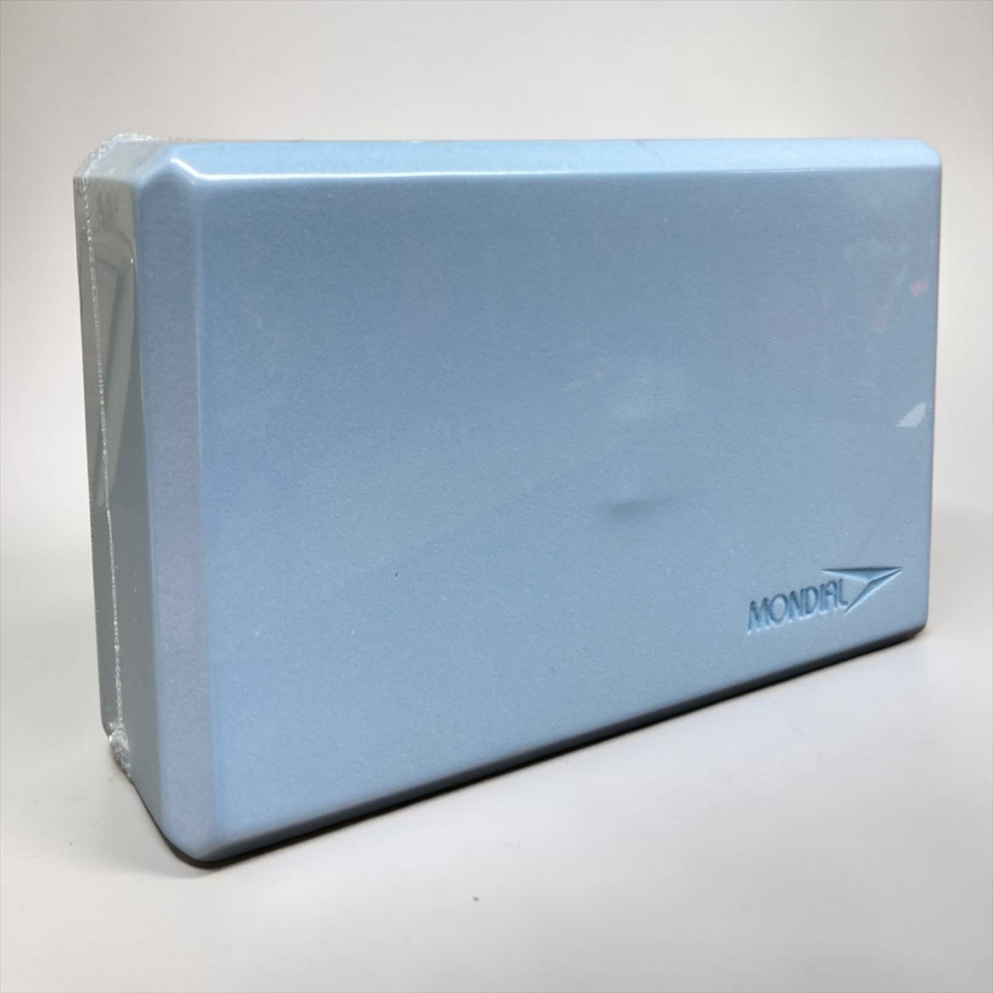 Blue foam block with 'Mondial' branding on a white background