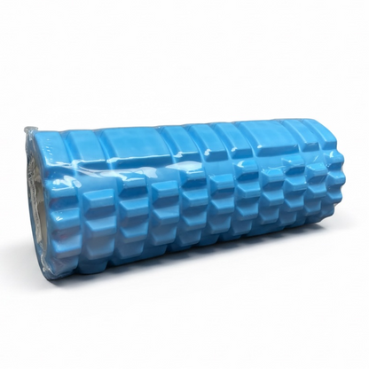 A blue textured foam roller with a raised honeycomb pattern, shown on a clean white background.