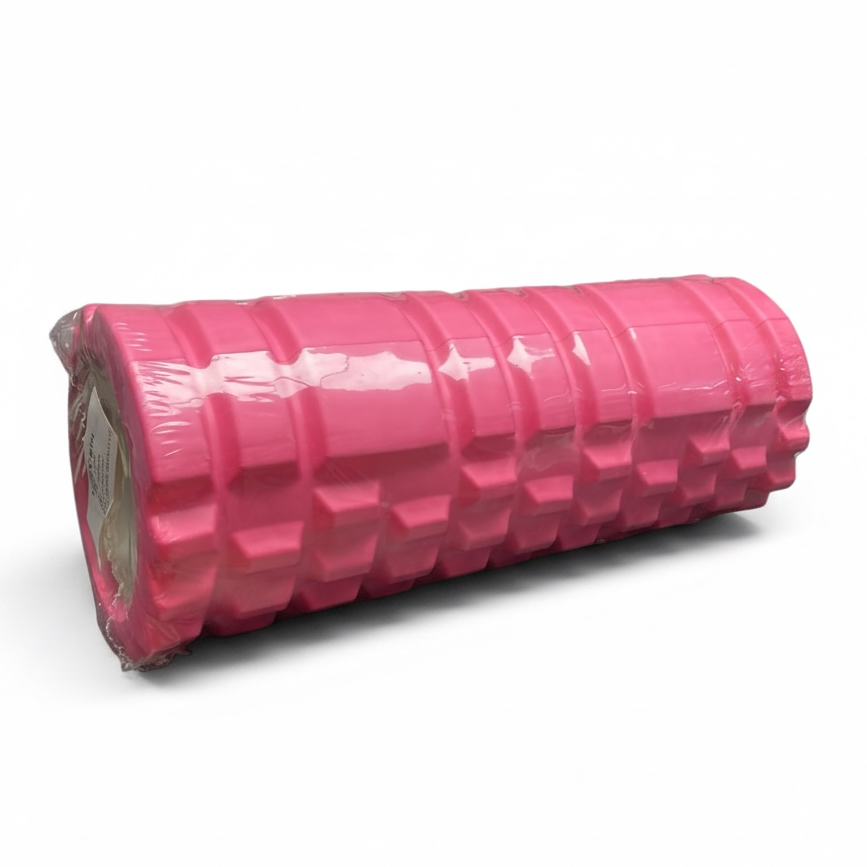 A pink textured foam roller wrapped in clear plastic, shown on a plain white background.