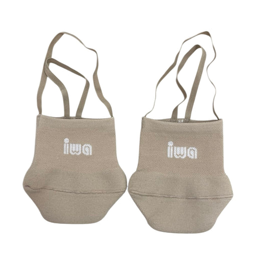 Two beige bags with 'iwa' branding on a white background