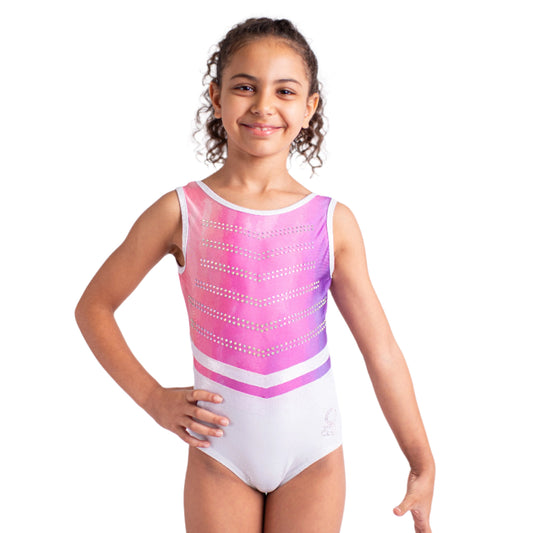 Young girl wearing a pink and white leotard on a plain background