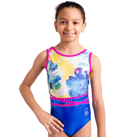 Girl wearing a colorful leotard with floral design on a white background