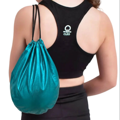 Person wearing a black sports bra with a logo and holding a teal drawstring bag on a white background